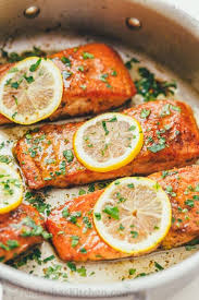 Spoon the pesto cream cheese sauce over the salmon. Pan Seared Salmon With Lemon Butter Video Natashaskitchen Com