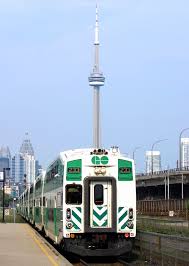 Go Train At Exhibition Go Station With A View Of Cn Tower In The Background Go Transit Toronto Pictures Visit Toronto