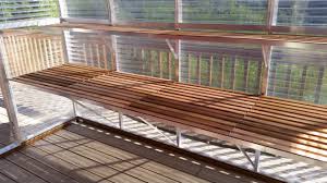 The bench has two small shelves and two large working spaces. Diy Greenhouse Staging