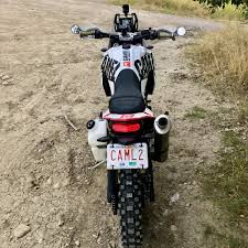 When full and riding dirt roads, the bike is actually more planted and felt like it vibrated less. T7 Camel Tank 389 Camel Adv Products Yamaha Tenere 700 Forum