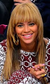 In this photo, beyonce teases her blonde hair back into a low ponytail. How Much Do You Love Beyonce S New Retro Do Glamour