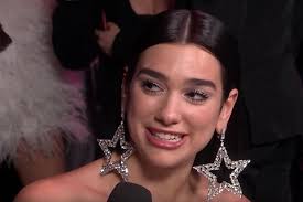 Gigi hadid's dad shares family photos with dua lipa and anwar as model prepares to welcome her first baby. Dua Lipa Takes Lookalike Dad To Brits As Fans Lust Over His Hunky Appearance Mirror Online