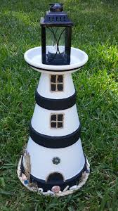Lighthouses have been around throughout history. 23 Garden Lighthouse Ideas Lighthouse Garden Lighthouse Lighthouse Crafts