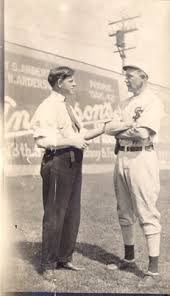 San Francisco Seals trainer Danny "Doc" Carroll and player Charles Baum at  Oakland] — Calisphere