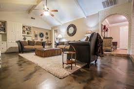 A critical component in a living room that unfortunately lacks the attention it deserves is the coffee table. Living Room Metallic Epoxy Floor Coating Rustic Family Room Dallas By Versatile Coatings Llc Houzz