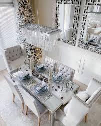 Various indoor plants add a tropical vibe in this gray dining area. 15 Glam Dining Rooms You Must See