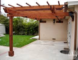 Check out this charming bungalow with an attached wood pergola and deck on hgtv.com. Pergola Kits Attached To House Attached Garden Pergolas