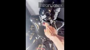 Rubber doll with open mouth gag