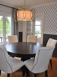 Contemporary Dining Room With Round Espresso Pedestal Dining Table And White Tufted Dining C Round Dining Room Round Dining Room Table Dining Room Contemporary