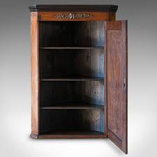 Constructed with durable laminate for strength and long term use. Antique Georgian English Oak And Mahogany Corner Cabinet 1800s For Sale At Pamono