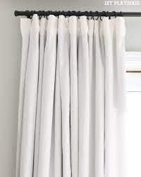 How To Make No Sew Black Out Curtains The Diy Playbook White Blackout Curtains Diy Curtains Cool Curtains