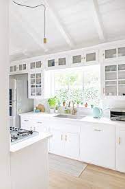 How To Make A 1950 S Kitchen Remodel Feel Like A Chef S Paradise White Kitchen Remodeling Kitchen Remodel Small Diy Kitchen Renovation