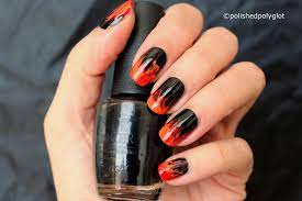 Acrylic nails tutorial how to acrylic nails with nail tips pink flames bling non dominant hand duration. Nail Art Black Red And Orange Fire Flames Manicure Polished Polyglot