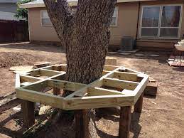 This type of bench is square in shape and provides a snug fit around the tree. 15 Best Tree Bench Ideas Tree Bench Outdoor Gardens Backyard