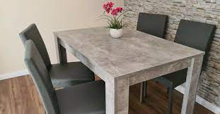 Grey is a chic and easy neutral to style around, and offers plenty of character whether you opt for a classic design or a modern table. Modern Wood Stone Grey Dining Table 4 Pu Faux Leather Chairs Ebay