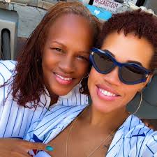 Me and aka @itzalwayzbeenabout_me aka #8, aka Mommy at the @cubs playoff  game today! Thank you so much Mommy for surprising James and getting us out  of the house, we had so