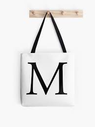 Its name in english is em (pronounced / ˈ ɛ m / ), plural ems. M Alphabet Letter Mike Michael Mary A To Z 13th Letter Of Alphabet Initial Name Letters Tag Nick Name Stofftasche Von Tomsredbubble Redbubble