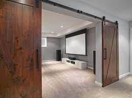 Our traditional barn door collection offers an assortment of unconventional yet stunning interior sliding barn doors. Barn Doors To Theatre Room Contemporary Home Theater Edmonton By Habitat Studio Houzz