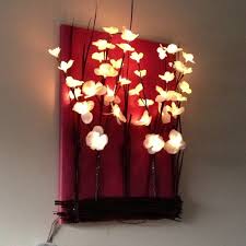 I thought this thumbtack wall design was just about the coolest thing ever, and wanted to mak… Styrofoam Or Canvas Covered With Scrapbook Paper Add Desired Branches Flowers Light Up Flower Branc Diy Arts And Crafts Canvas Light Art Canvas Art Projects