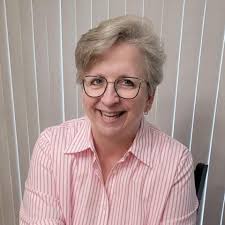 Decorating fall displays at McCready Manor