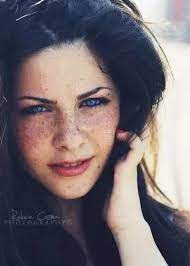 A beautiful woman with red hair and freckles. What Are The Chances Of Having Dark Hair And Freckles Quora