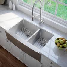This stainless steel sink comes complete with a number of additional items that just help to make it even more functional than you could have fireclay 33 l x 20 w double basin farmhouse kitchen sink with aqua divide. Kraus Farmhouse 60 40 Double Bowl 16 Gauge Stainless Steel Kitchen Sink Kitchensource Com