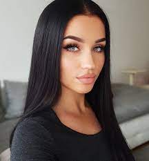 Black haired woman with voluminous, shiny and curly hairstyle.frizzy hair. 110 Black Haired Beauties Ideas Dark Hair Hair Pale Skin Black Hair Blue Eyes