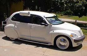 i was fascinated by the thing sticking out the window i understand it s an old style air conditioner chrysler pt cruiser chrysler airflow cruisers chrysler pt cruiser chrysler airflow