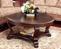 T4968 In By Ashley Furniture In Tacoma Wa Round Cocktail Table Coffee Table Wood Round Wood Coffee Table Traditional Coffee Table