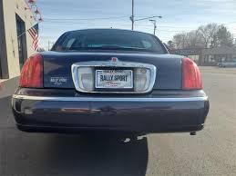 Image result for Charcoal Green 1999 Town Car