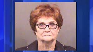 Woman arrested at airport says she...