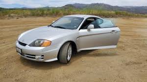 Image result for Pewter Silver 2003 Tiburon
