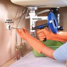 How To Clean And Unclog A Kitchen Sink Drain Sink Drain Kitchen Sink Clogged Unclog Sink