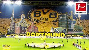Bundesliga borussia dortmund s yellow wall a crown jewel of german football. Borussia Dortmund Fans Show Spectacular Tifo On Yellow Wall Youtube