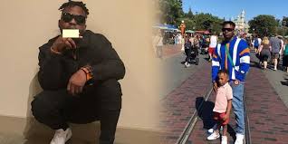Rapper olamide shared a photo of himself and his 3 months old son, maximiliano. Olamide Takes His Son On A Trip To Disneyland Photo