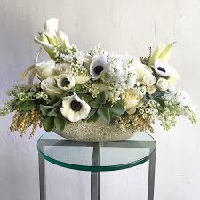 While we love the idea of always having a fresh flower arrangement on your dining table, that's not a very realistic goal. The Table Center Arrangement In Los Angeles Ca The Petal Workshop