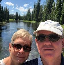 Is a noisy fridge compressor normal when boondocking in warm weather?