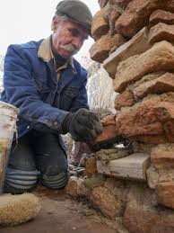 Adobe repair with bluegrass accompaniment