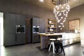 The Renovated Shop Window Of Our Partner Cesar Store Genova Progetti Arredamenti The New Maxima 2 2 Combines Stainless Steel Inox And Eco Cement Tall U Cucine