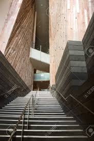 (it's a 1936 home.) there is no way to get a rail long enough for the stairwell into the space. Narrow Stairs With Handrails And Wooden Walls In Modern Architecture Stock Photo Picture And Royalty Free Image Image 17465562