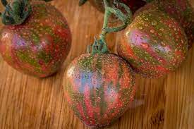 Firm and juicy flesh with a rich flavor. Black Zebra Cherry Tomato Vertiloom