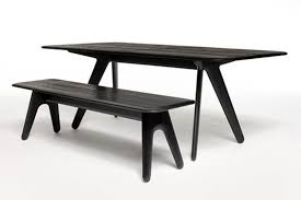 The dining table features a rich honey oak finish and beautiful carved legs. Slab Rectangular Dining Table By Tom Dixon Stylepark