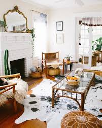 How To Tastefully Incorporate Animal Prints In Your Home Rugs In Living Room Cowhide Rug Living Room Home Decor