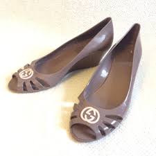 May 05, 2021 · gucci rubber logo platform slide sandal gucci rubber slide sandals luckily, plenty of brands have made their own takes on the trendy shoe — varying silhouettes, colors, materials, heel height, and more. Gucci Shoes Gucci Marola Jelly Wedge Sandals Poshmark