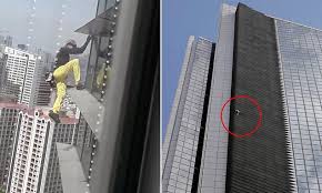 A police spokeswoman said robert faces at. The French Spider Man Conquers 712ft Gt Tower In Phillippines Without Safety Gear