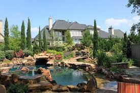 Public swimming pools in hong kong are managed by the leisure and cultural services department (lcsd). Swimming Pool Spa Koi Pond Gardens Rustic Pool Dallas By Bellinger Design Group Houzz