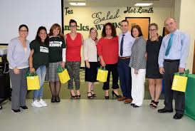 The Lynbrook High School cafeteria was filled with administrators ...