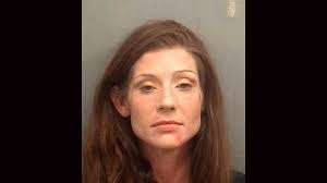 Police: Woman steals patrol car, gets tackled by homeowner