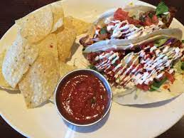 Season the fish pieces all over with salt and pepper and coat with the flour. Fish Tacos With Homemade Salsa Picture Of Houlihan S Hershey Tripadvisor