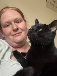Lauren and Lewis fell in love with Pookie age 11 from Wales Cat Centre